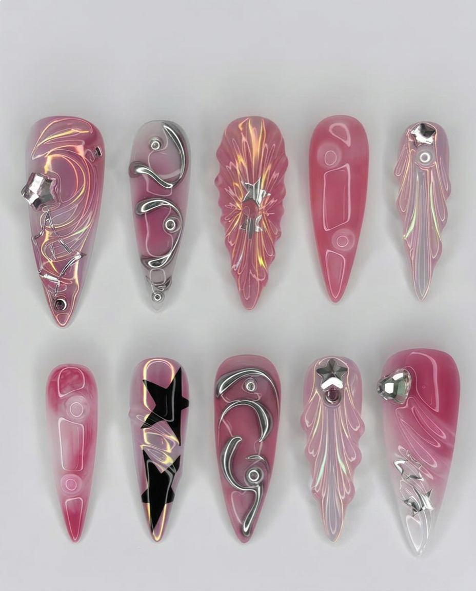 Pink chrome stiletto press-on nail set with silver gems and star charms