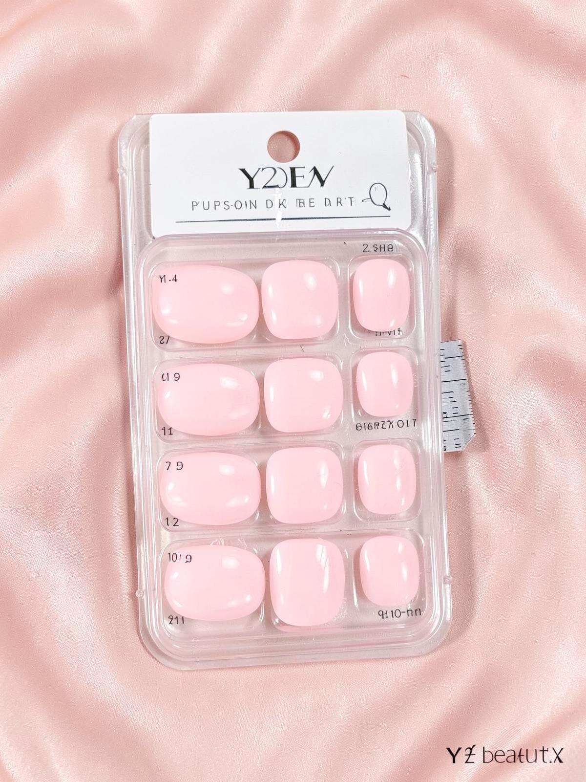 JDA nail sizing kit with ten numbered blank tips and a measuring strip